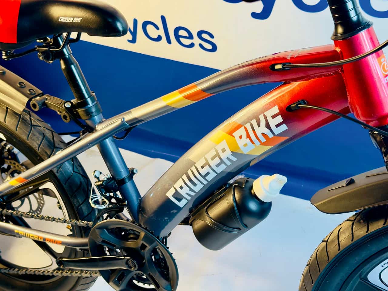 Cruiser Bike in Redish Tone with Disk Brakes and Hydraulic Shocks