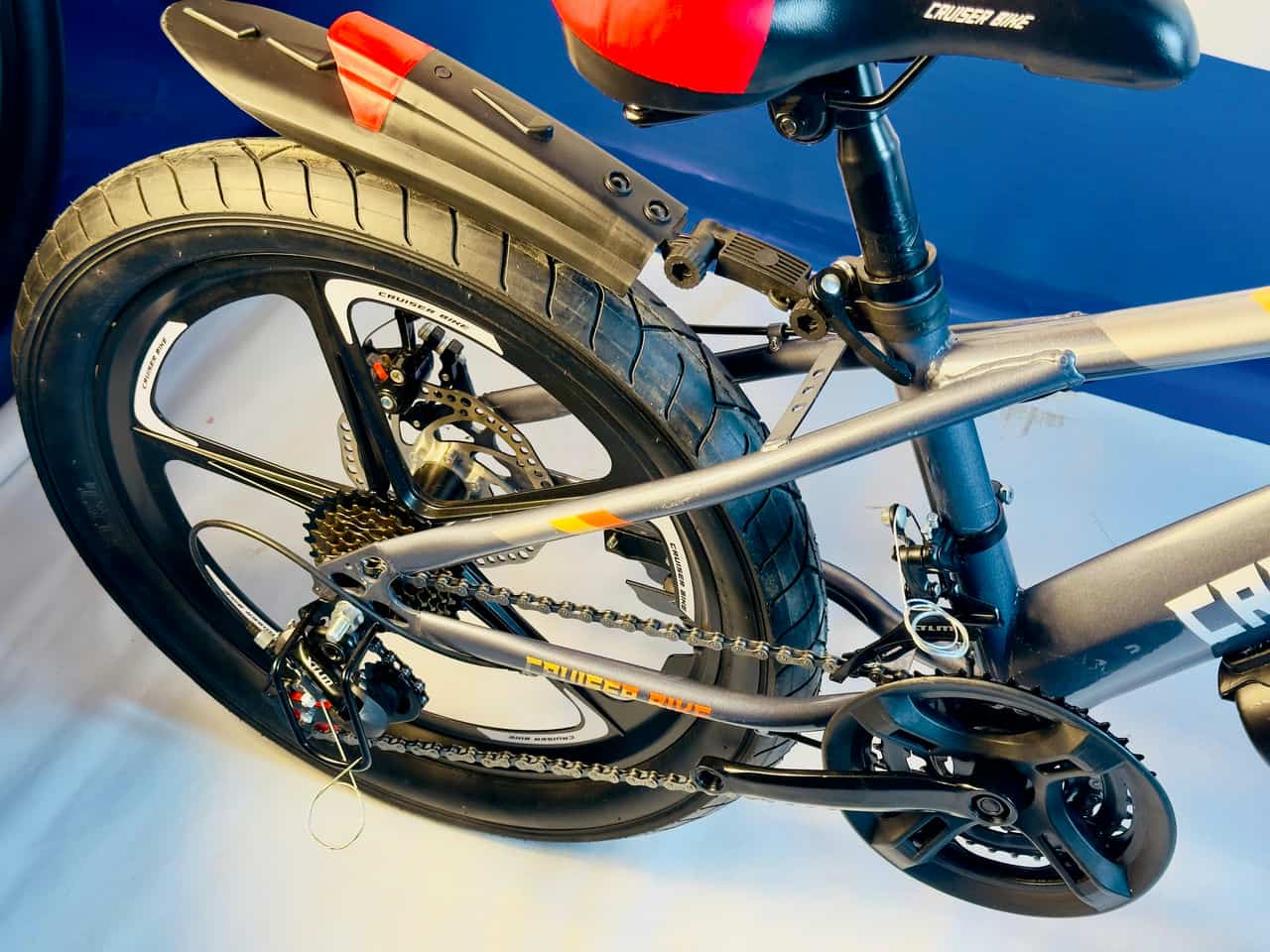 Cruiser Bike in Redish Tone with Disk Brakes and Hydraulic Shocks