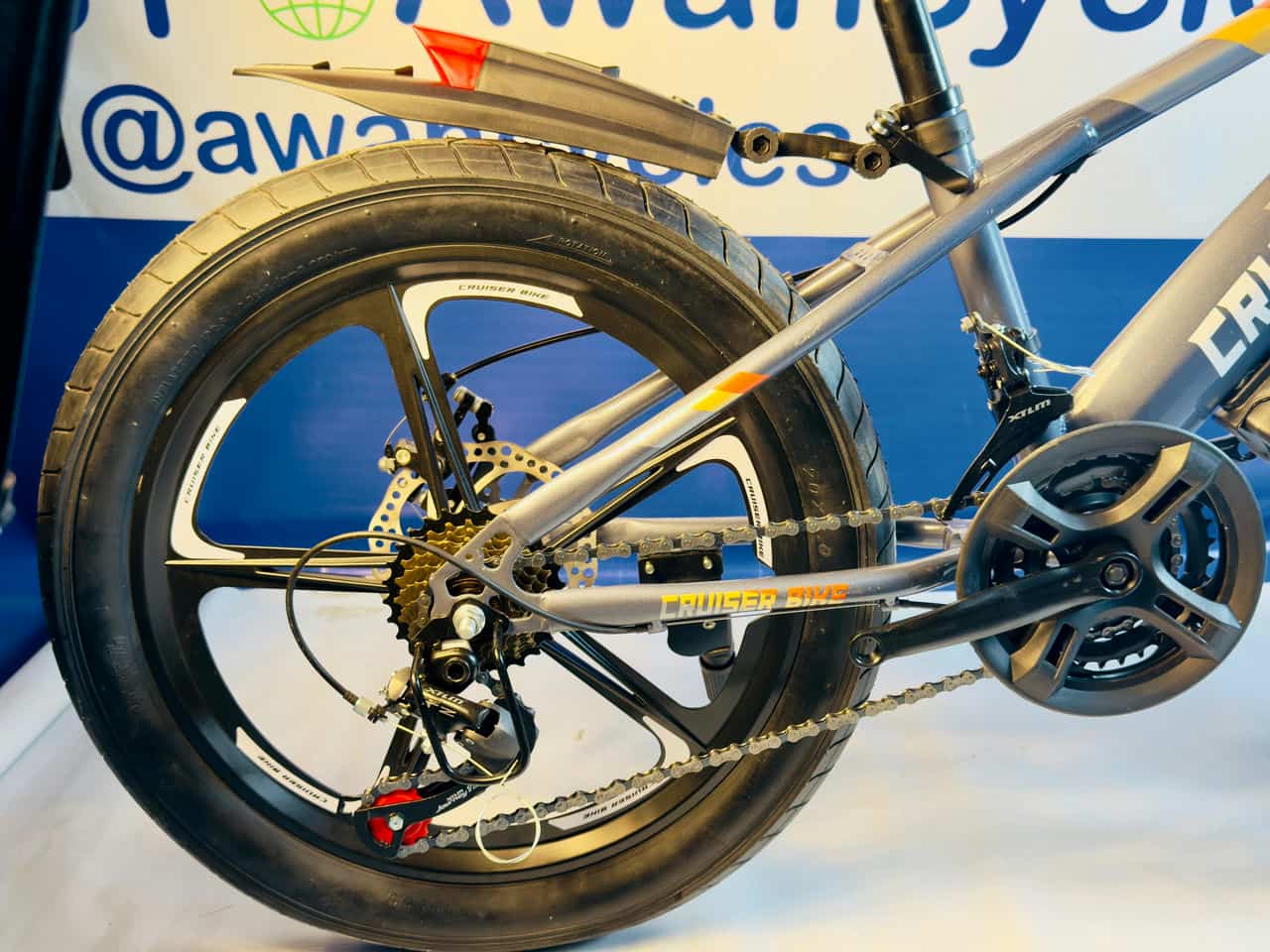 Cruiser Bike in Redish Tone with Disk Brakes and Hydraulic Shocks