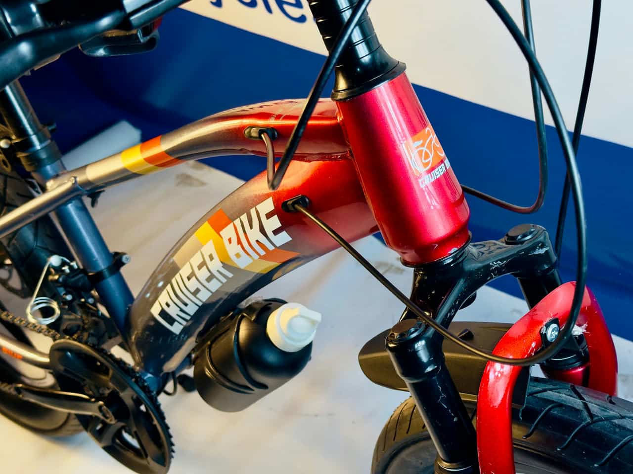 Cruiser Bike in Redish Tone with Disk Brakes and Hydraulic Shocks