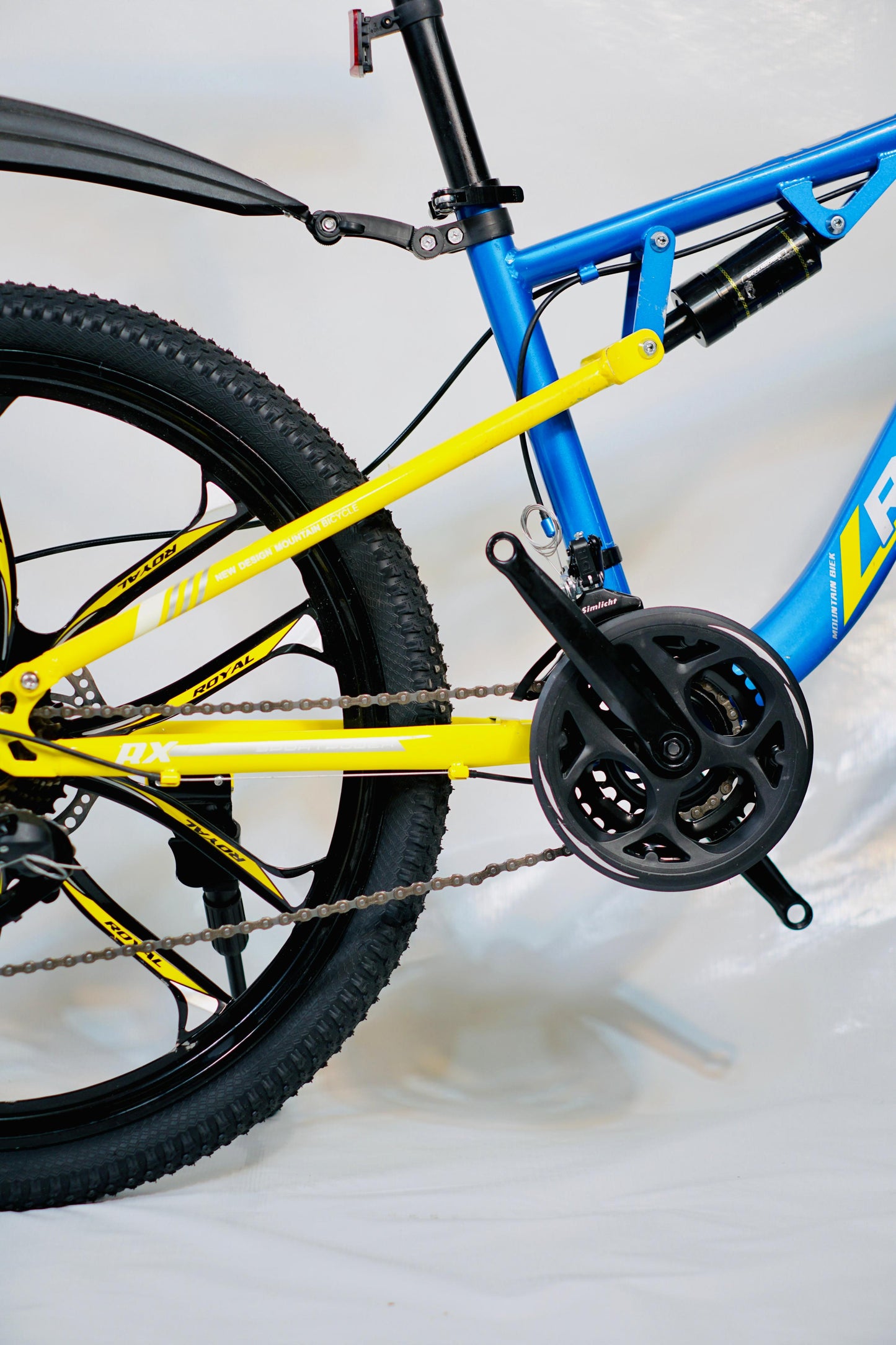 24 Inch Gear Cycle with Dual Disc Brakes & Hydraulic Shocks Blue and Yellow Color