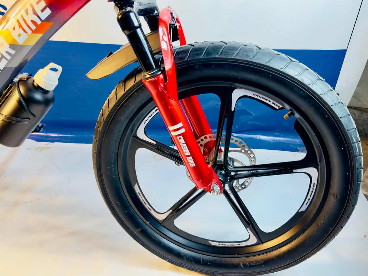 Cruiser Bike in Redish Tone with Disk Brakes and Hydraulic Shocks