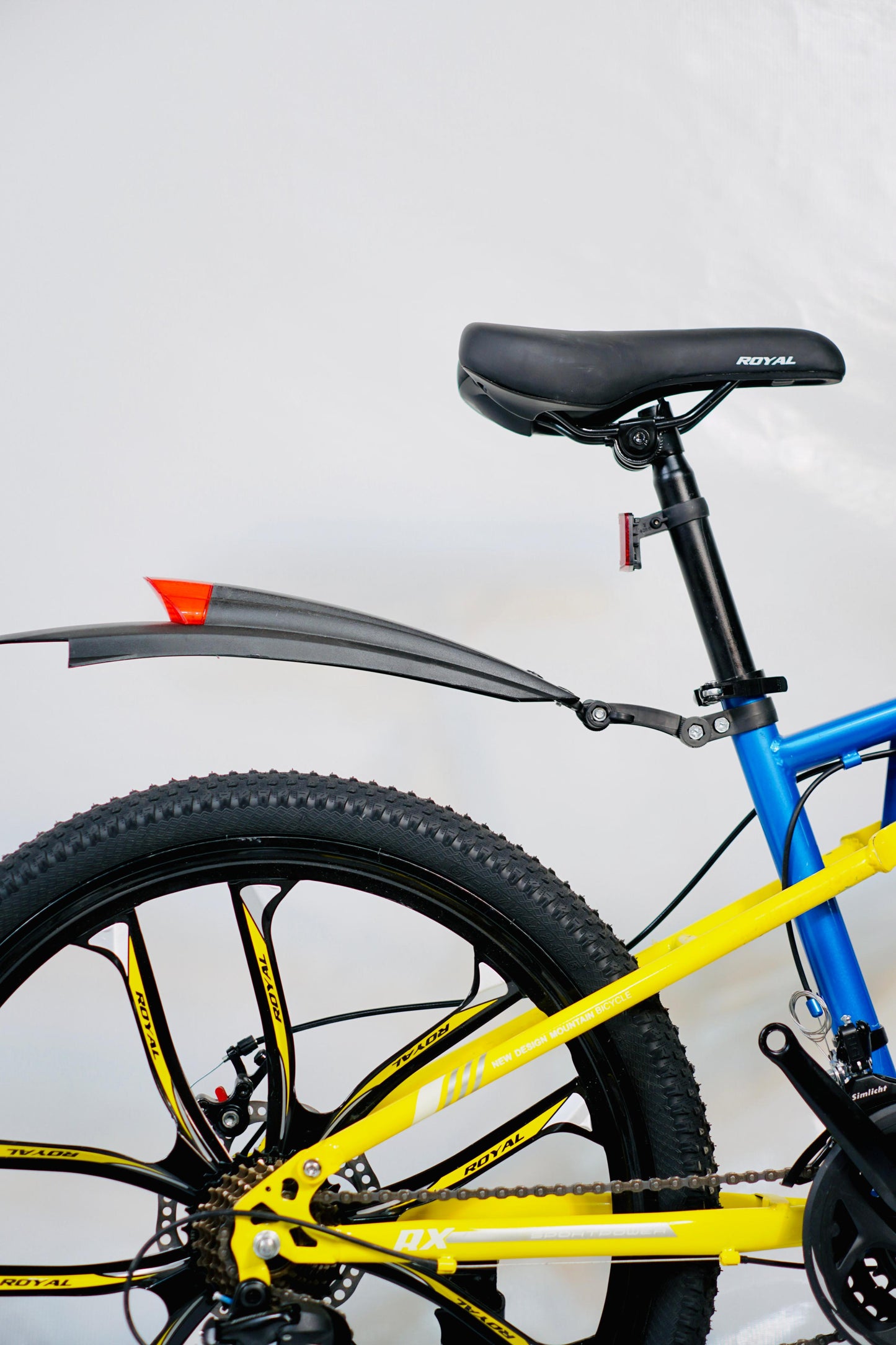 24 Inch Gear Cycle with Dual Disc Brakes & Hydraulic Shocks Blue and Yellow Color