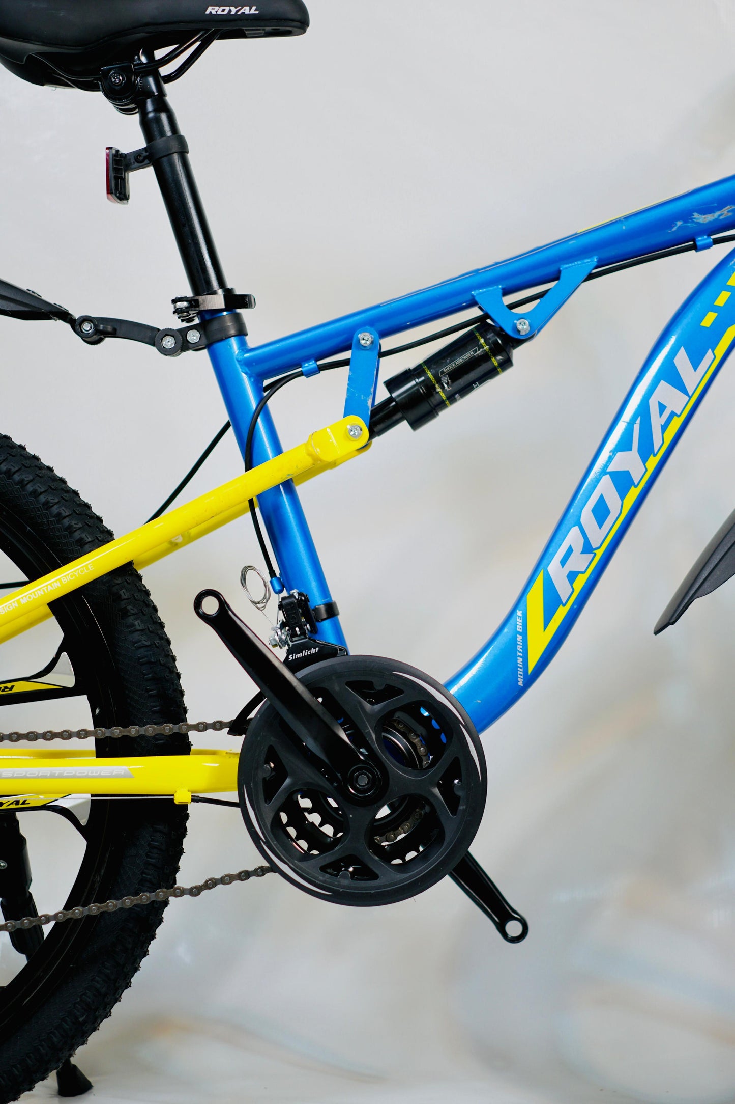 24 Inch Gear Cycle with Dual Disc Brakes & Hydraulic Shocks Blue and Yellow Color